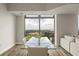 Bright dining area featuring a glass table and chairs with city views at 270 17Th Nw St # 3604, Atlanta, GA 30363