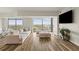 Bright living room featuring floor-to-ceiling windows with city views and contemporary furnishings at 270 17Th Nw St # 3604, Atlanta, GA 30363