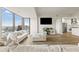Comfortable living space with city views, an open layout, and modern decor and furnishings at 270 17Th Nw St # 3604, Atlanta, GA 30363