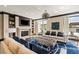 Beautiful club room featuring fireplace, TV, bookshelves and comfortable seating at 270 17Th Nw St # 3604, Atlanta, GA 30363