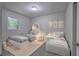 Charming ' bedroom with twin beds, playful decor, and ample storage at 3647 Miller St, Lithia Springs, GA 30122