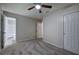 Bedroom with new carpeting and access to the bathroom at 3647 Miller St, Lithia Springs, GA 30122