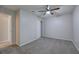 Bedroom with ceiling fan and new carpeting at 3647 Miller St, Lithia Springs, GA 30122