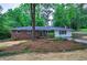 Charming brick home with a landscaped front yard and inviting curb appeal at 3647 Miller St, Lithia Springs, GA 30122