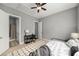 Cozy bedroom featuring neutral colors, with direct access to the bathroom at 403 Aristides Way, Canton, GA 30115