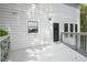 View of the back deck with gray wood and siding of the home at 907 Edgewood Ave, Atlanta, GA 30307