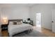Bedroom featuring a comfortable bed, a desk, and an ensuite bathroom at 907 Edgewood Ave, Atlanta, GA 30307