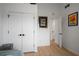 Bright room featuring hardwood floors, white walls, and white doors with black hardware at 907 Edgewood Ave, Atlanta, GA 30307