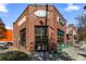 Exterior view of a brick building with Kale Crazy signage and outdoor seating at 907 Edgewood Ave, Atlanta, GA 30307