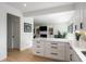Open concept kitchen with a large island, granite countertops, and stainless steel appliances at 907 Edgewood Ave, Atlanta, GA 30307
