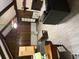 Overhead view of spacious living room with vaulted ceiling and a stone fireplace at 9214 Brave Ct, Jonesboro, GA 30236