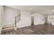 Bright living space with stairs, open floor plan, and easy access to the kitchen at 1139 Blue Juniper Cir, Loganville, GA 30052