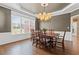 Inviting dining area with a large window view of the exterior at 135 Ardsley Run, Canton, GA 30115