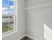 Walk-in closet with wire shelving and a window for natural light at 176 Villa Rosa Rd, Temple, GA 30179