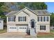 Charming two-story home with black shutters, a two car garage, and a welcoming front entrance at 176 Villa Rosa Rd, Temple, GA 30179