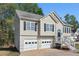 Charming two-story home features a two car garage, black shutters, and a welcoming front entrance at 176 Villa Rosa Rd, Temple, GA 30179