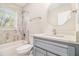 Bathroom with a tub-shower, vanity with a white countertop, and light fixtures at 2168 Doris Dr, Decatur, GA 30034