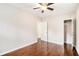 Hardwood-floored bedroom features a ceiling fan, and closet access at 2168 Doris Dr, Decatur, GA 30034