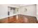 Spacious living room with gleaming hardwood floors and natural light at 2168 Doris Dr, Decatur, GA 30034