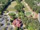 Overhead shot of the Clubhouse and lush Golf Course at 1514 Maplewood Ct, Woodstock, GA 30189