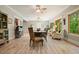 Dining area featuring hardwood floors, neutral paint and plenty of seating around the wooden table at 1514 Maplewood Ct, Woodstock, GA 30189