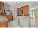 Custom kitchen featuring granite counters, stainless appliances, an island, and modern lighting fixtures for cooking at 1514 Maplewood Ct, Woodstock, GA 30189
