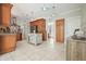 Well-appointed kitchen with custom cabinetry, an island, stainless steel appliances, and a neutral color scheme at 1514 Maplewood Ct, Woodstock, GA 30189