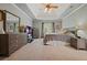 Main bedroom with trey ceiling, carpet flooring, and soft, neutral decor at 1514 Maplewood Ct, Woodstock, GA 30189