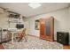 Office space with a desk, chair, cabinet, and patterned rug on hardwood flooring at 1514 Maplewood Ct, Woodstock, GA 30189