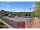 Community tennis courts offer an opportunity for friendly games at 1514 Maplewood Ct, Woodstock, GA 30189