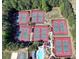 Aerial view of multiple tennis courts in a wooded area, with surrounding community amenities at 1514 Maplewood Ct, Woodstock, GA 30189