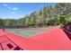 Well-maintained community tennis courts offer a fantastic amenity for residents at 1514 Maplewood Ct, Woodstock, GA 30189