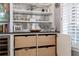 Living room cabinets with sliding drawers at 2444 Ballantrae Cir, Cumming, GA 30041