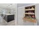 Pantry with pull out shelves and easy access to the kitchen at 2444 Ballantrae Cir, Cumming, GA 30041