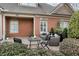 Cozy outdoor patio area with comfortable seating and charming landscaping at 2444 Ballantrae Cir, Cumming, GA 30041