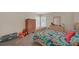Bright bedroom featuring a bed with colorful mermaid-themed bedding and a cozy setup, suitable for a  at 35 Kestrel Circle, Covington, GA 30014