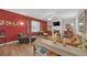 Comfortable living room featuring a fireplace, hardwood floors, and stylish decor at 35 Kestrel Circle, Covington, GA 30014