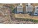Drone shot revealing backyard with dining set and pristine lawn area at 5460 Wheeler Ridge Rd, Auburn, GA 30011