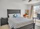 Cozy bedroom with large windows and neutral decor, inviting and serene at 5460 Wheeler Ridge Rd, Auburn, GA 30011