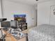 Bedroom with multiple monitors and TV and overhead lighting at 5460 Wheeler Ridge Rd, Auburn, GA 30011