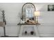 Bright Foyer features stylish decor, arched mirror, and decorative table at 5460 Wheeler Ridge Rd, Auburn, GA 30011