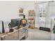 Bright office space with natural light, desk, shelving, and neutral carpeting at 5460 Wheeler Ridge Rd, Auburn, GA 30011