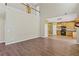 Bright living space with an open floorplan adjacent to the kitchen at 6655 Grove Meadows Ln, Cumming, GA 30028