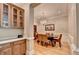 Charming dining room with elegant chandelier and natural light at 7512 Portbury Park Ln, Suwanee, GA 30024