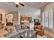 Open-concept layout featuring the living room, kitchen and dining nook at 7512 Portbury Park Ln, Suwanee, GA 30024