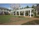 Inviting community pergola featuring classic design with lush landscaping at 7512 Portbury Park Ln, Suwanee, GA 30024