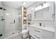 Modern bathroom featuring glass-enclosed shower, white vanity, and stylish fixtures at 9250 Nesbit Lakes Dr, Alpharetta, GA 30022