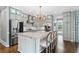 Spacious kitchen with stainless steel appliances, a center island, and modern finishes at 9250 Nesbit Lakes Dr, Alpharetta, GA 30022