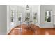 Cozy breakfast nook with natural light and hardwood floors and backyard views, perfect for Gathering meals at 116 Edgeview Ct, Dallas, GA 30157
