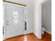 Welcoming foyer with front door with decorative glass and access to a powder room at 116 Edgeview Ct, Dallas, GA 30157
